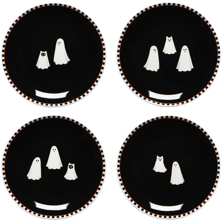 Four black appetizer plates with ghost faces