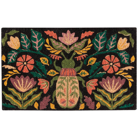 Black coir doormat with colourful amulet and botanical design